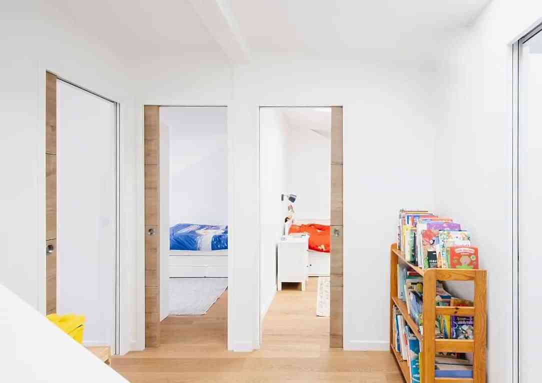 Surélévation d'une maison de ville - aménagement des combles - accès aux nouvelles chambres