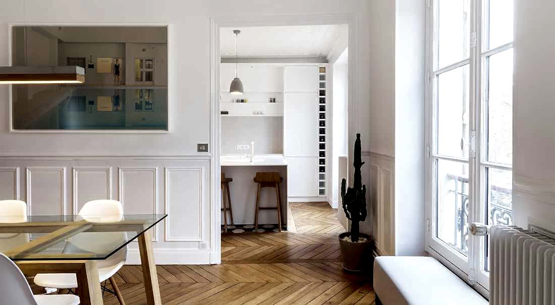 Aménagement d'un cuisine ouverte dans un salon par un architecte à Paris