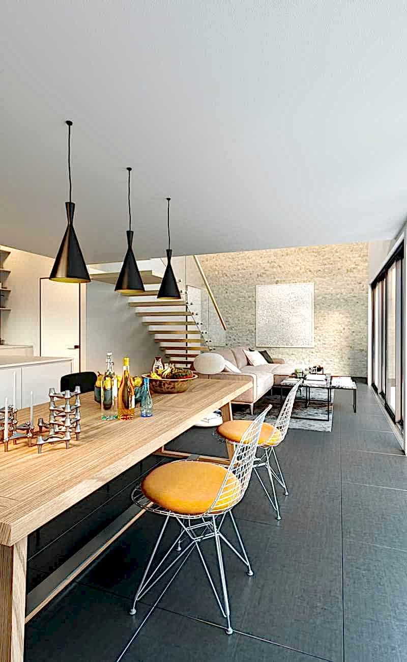 Réhabilitation d'un hangar en loft - la cuisine avec vue sur le séjour