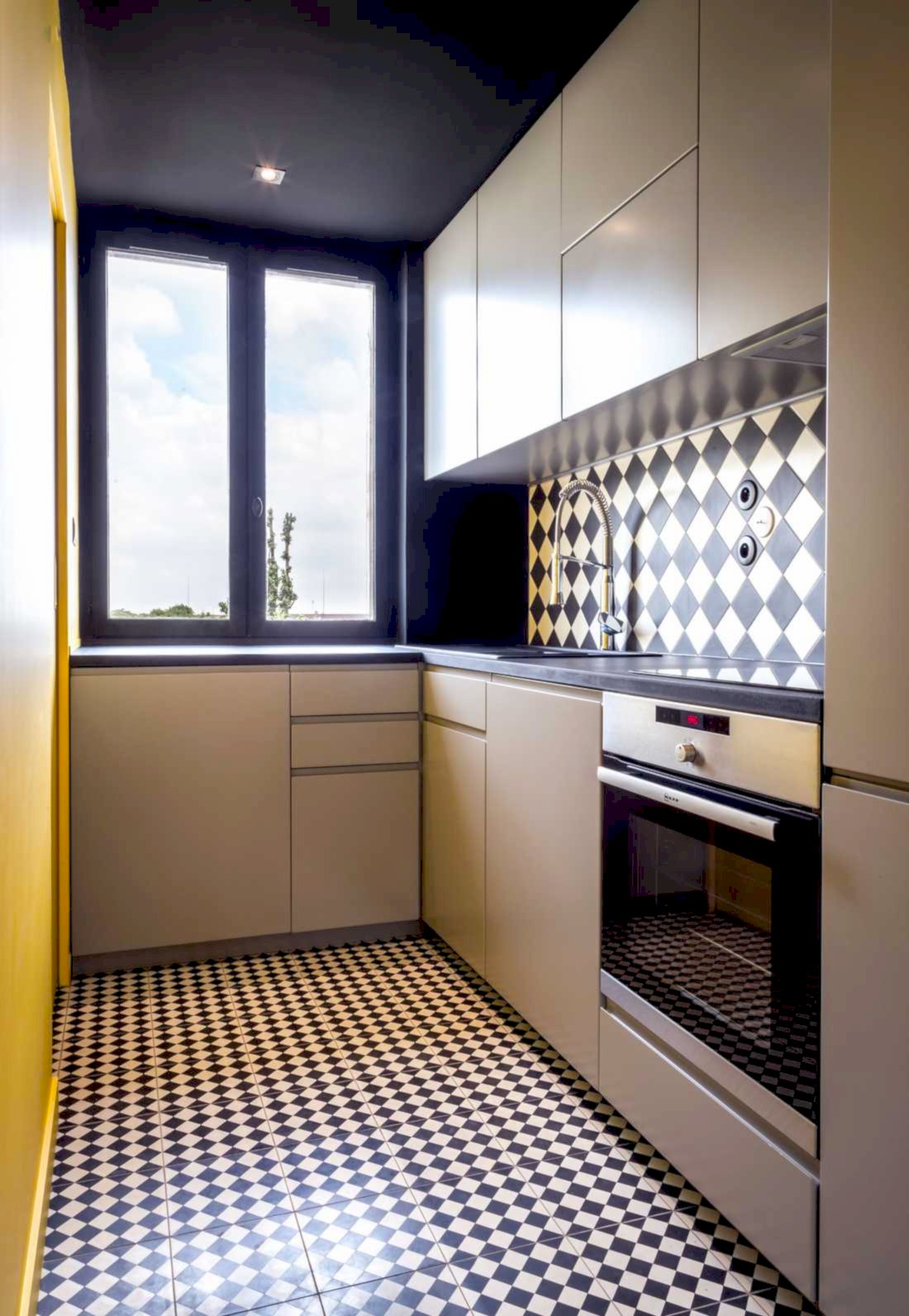 Cuisine aménagée dans un appartement haussmannien