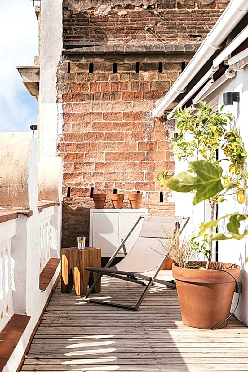 Aménagement d'un toit-terrasse en bois - terrasse côté balcon