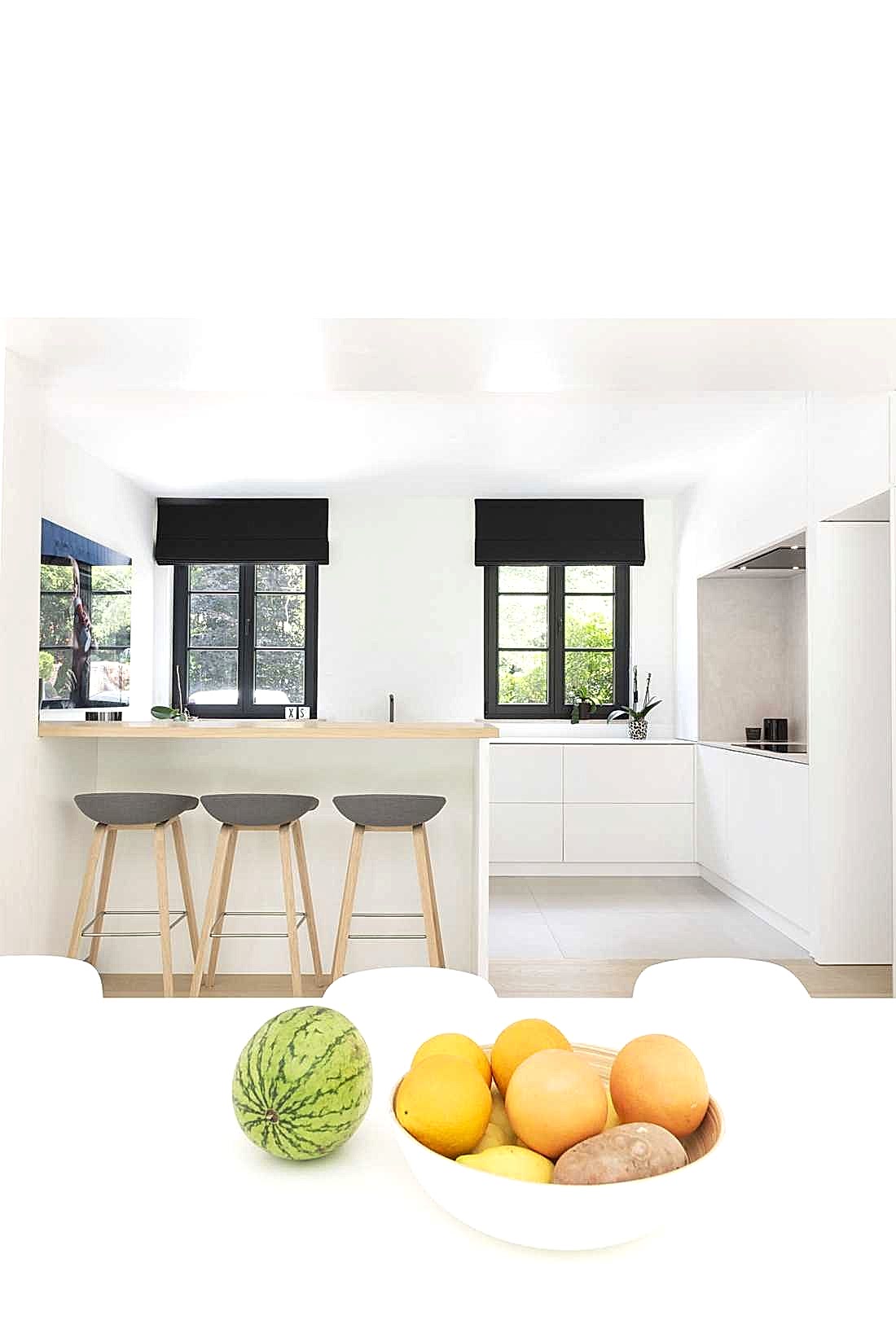 Cuisine ouverte d'une villa rénovée par un architecte d'intérieur à Paris