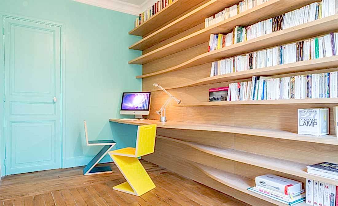 Bibliothèque sur mesure créé par un architecte d'intérieur pour la rénovation d'un appartement haussmannien