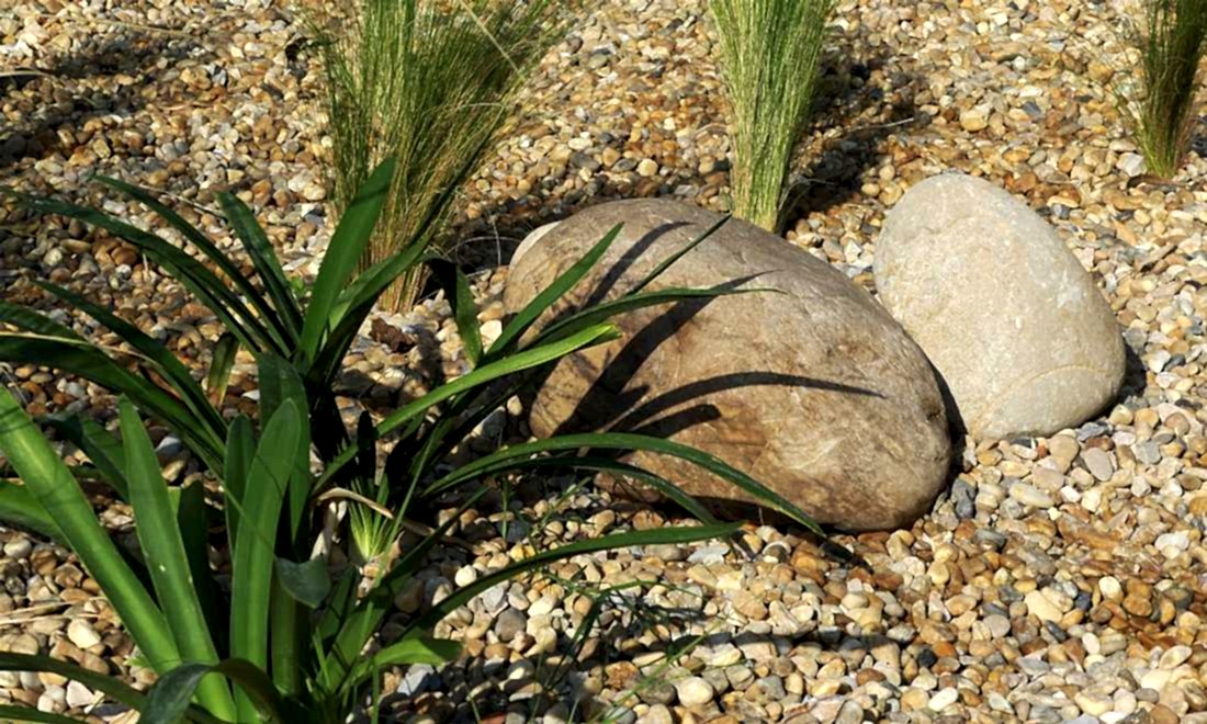 Galets déco dans jardin aménagé par un paysagiste