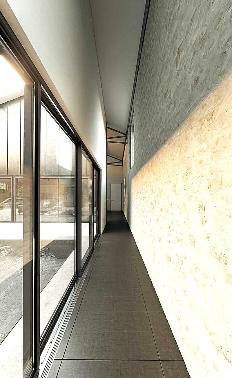 Réhabilitation d'un hangar en loft - couloir connectant les espaces