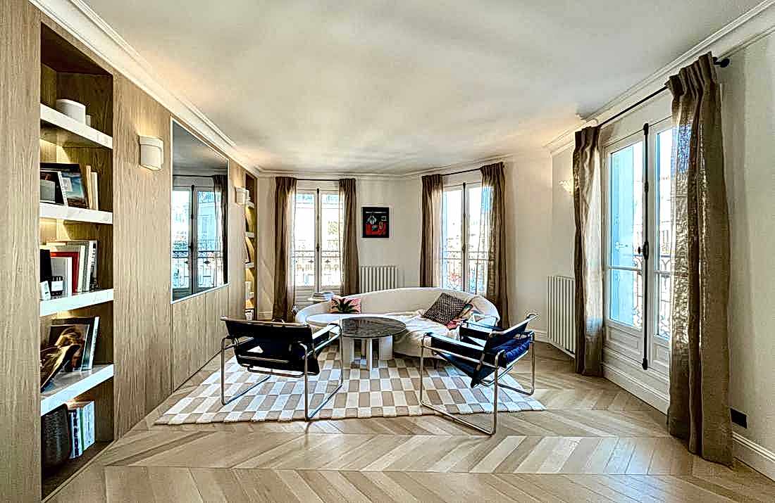 Réunion de deux appartements haussmanniens par un architecte à Paris 