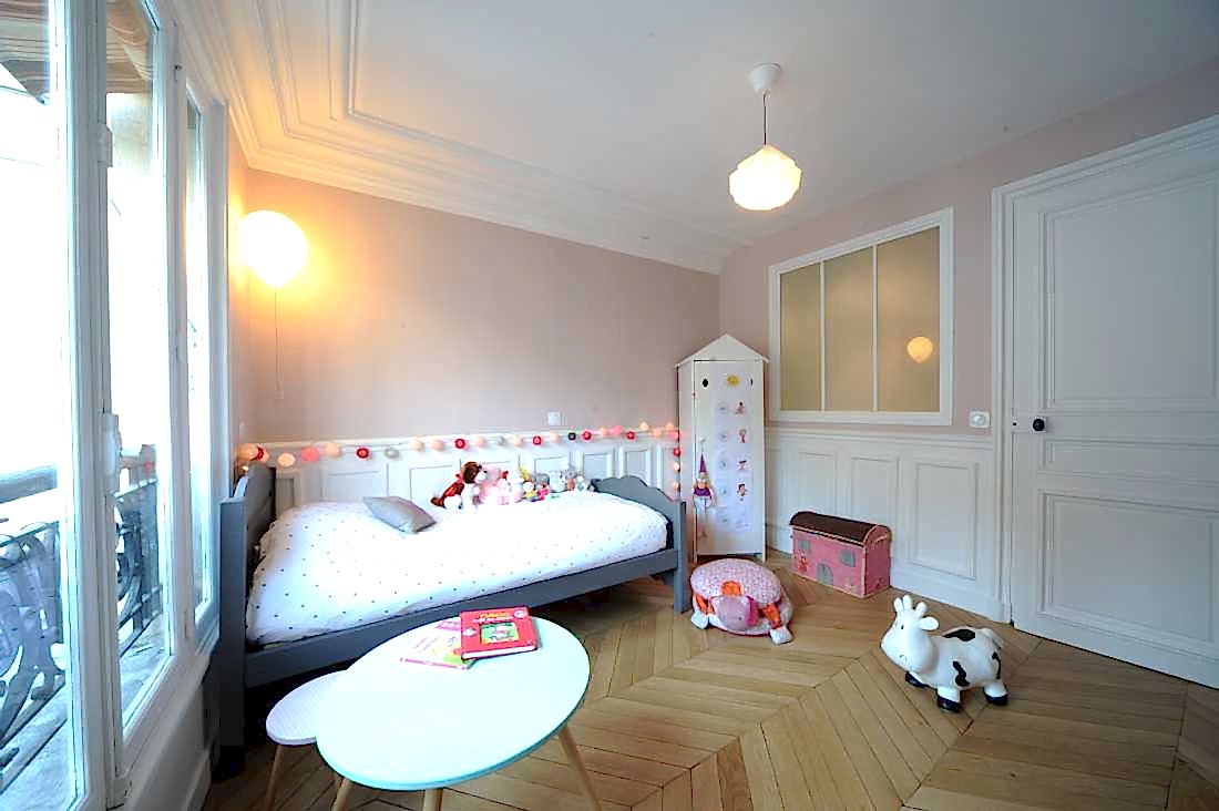 Chambre d'enfant après les travaux d'aménagement et de redistribution