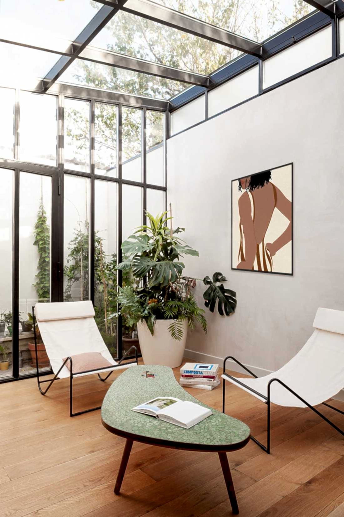 Extension d'une maison de ville avec verrière en acier