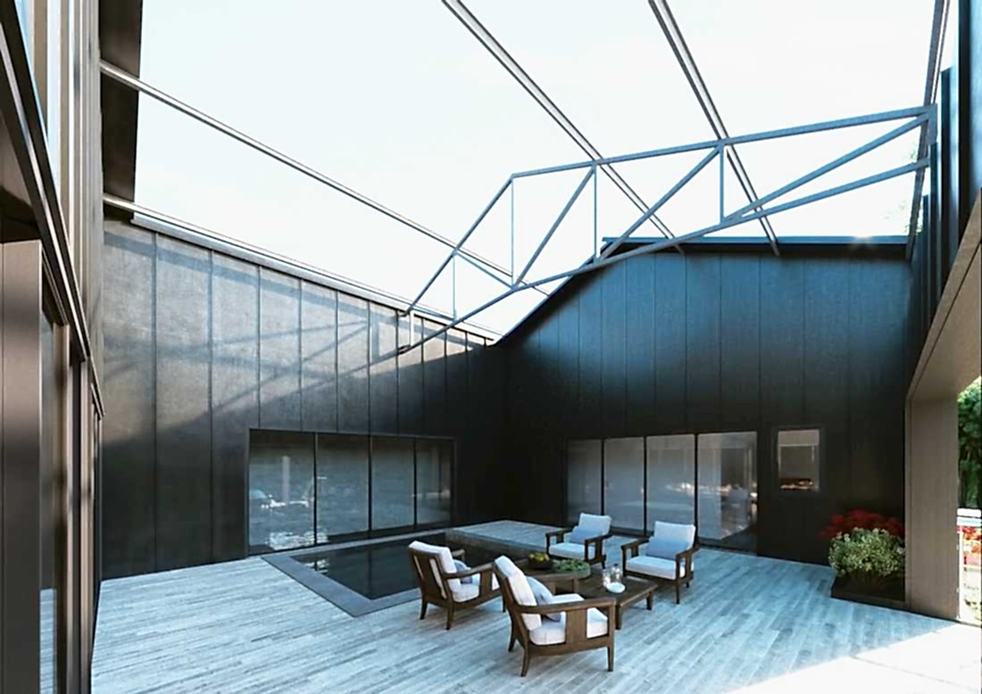 Réhabilitation d'un hangar en loft - cour intime au centre du loft