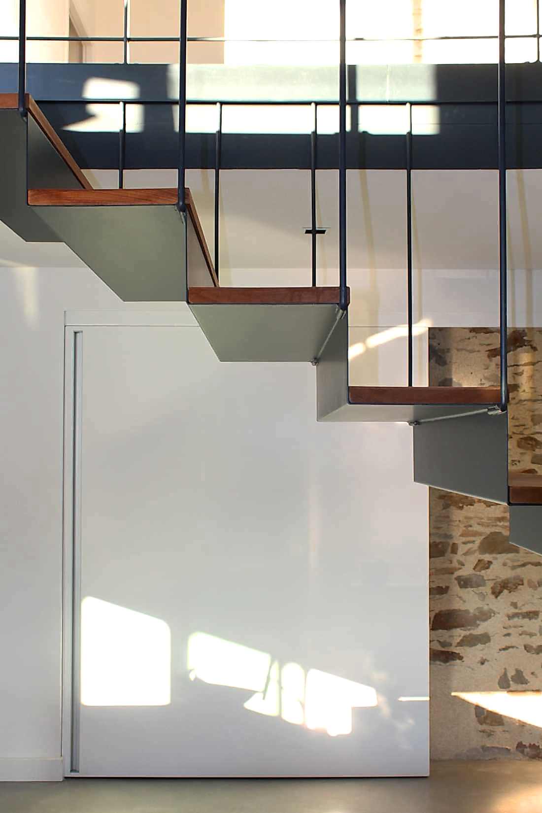 Escalier sur-mesure conçu par un architecte dans un loft